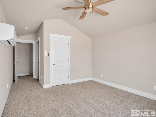 unfurnished bedroom with a wall unit AC, ceiling fan, light carpet, and lofted ceiling