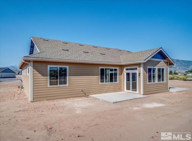 rear view of house featuring a patio area