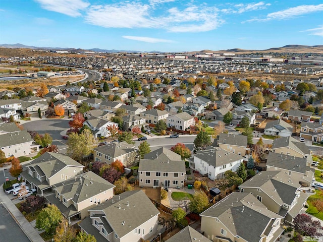 birds eye view of property featuring a mountain view