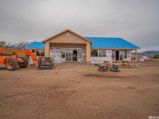 exterior space featuring a mountain view