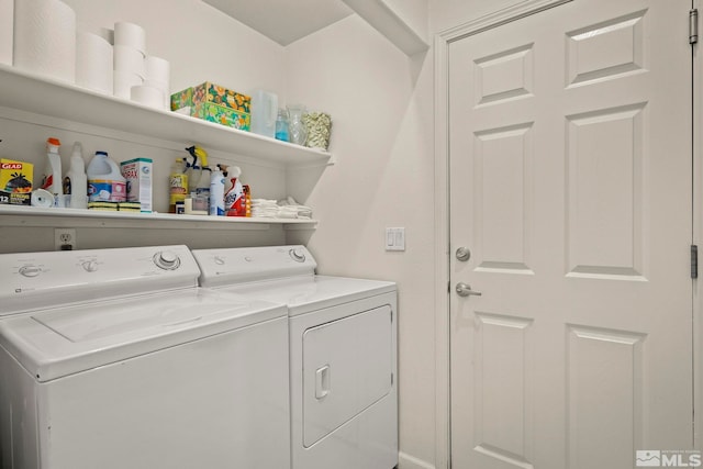 washroom with independent washer and dryer