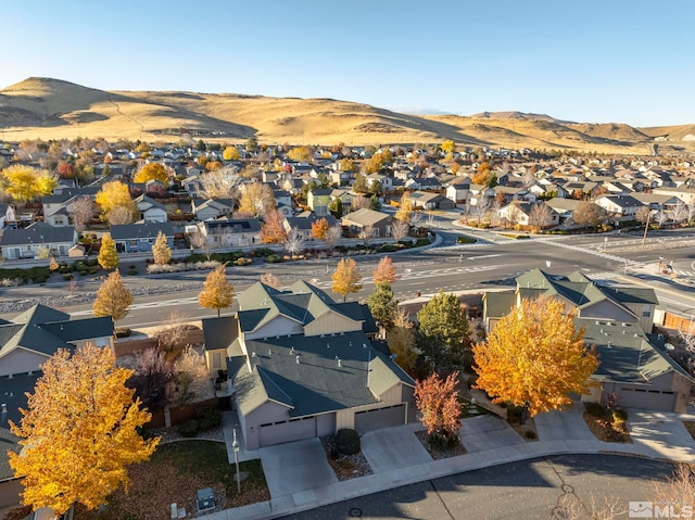 drone / aerial view featuring a mountain view