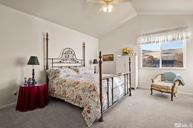 carpeted bedroom featuring ceiling fan and lofted ceiling