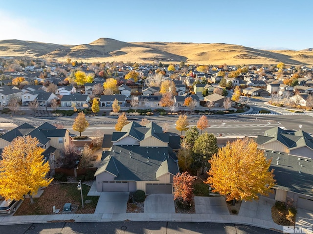 drone / aerial view featuring a mountain view