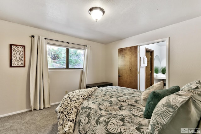 bedroom with light carpet