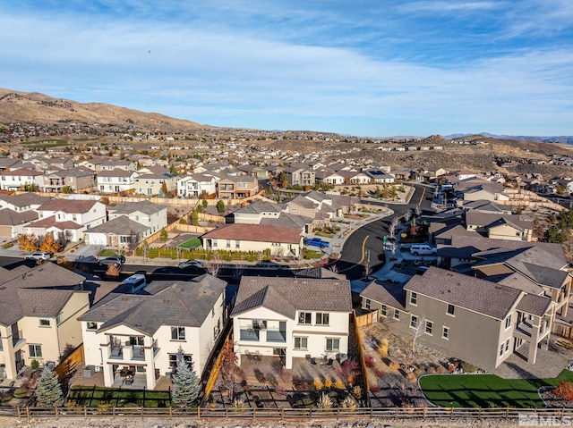 drone / aerial view featuring a mountain view