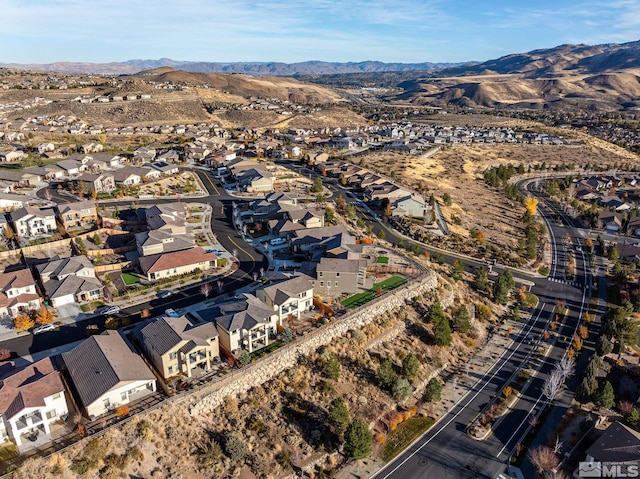 drone / aerial view featuring a mountain view