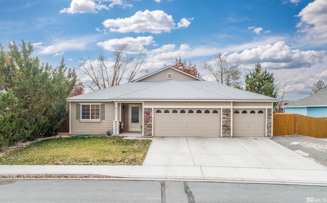 single story home with a front yard and a garage