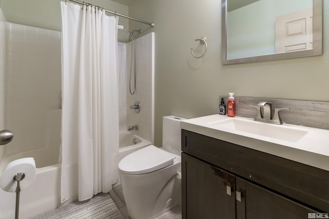 full bathroom featuring shower / tub combo with curtain, vanity, and toilet