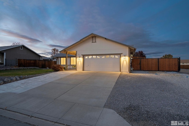 ranch-style home featuring a garage