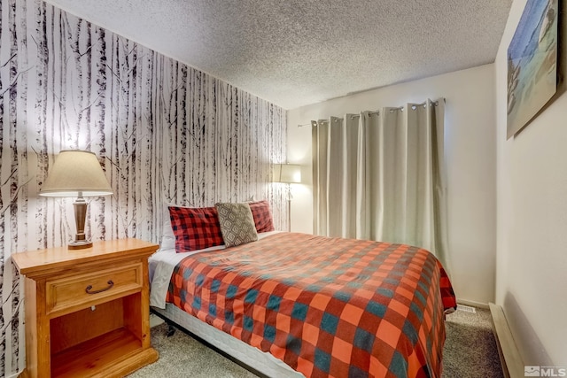 carpeted bedroom with a textured ceiling