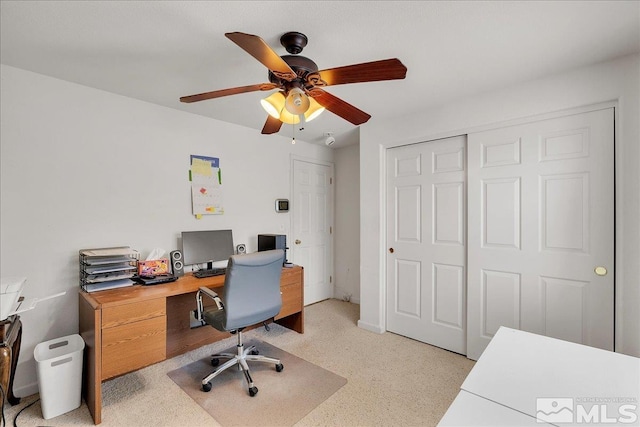 office space with ceiling fan