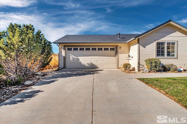 single story home featuring a garage