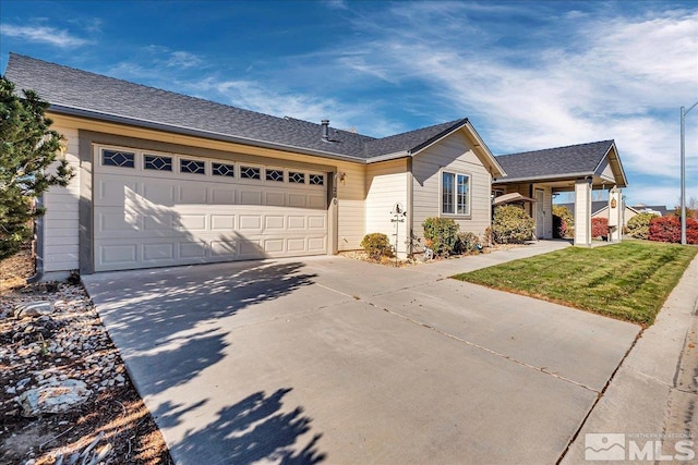 ranch-style home featuring a front yard and a garage