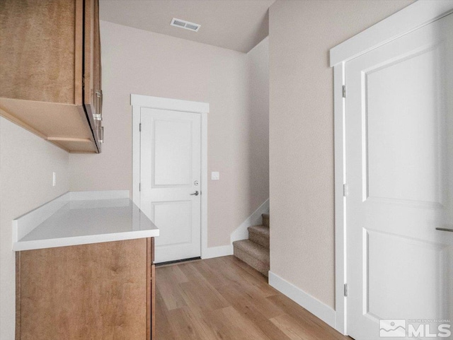 kitchen with light hardwood / wood-style flooring