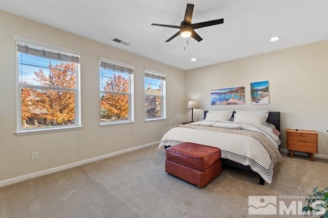 carpeted bedroom featuring ceiling fan