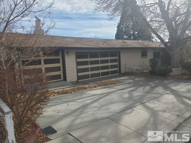 exterior space with a garage