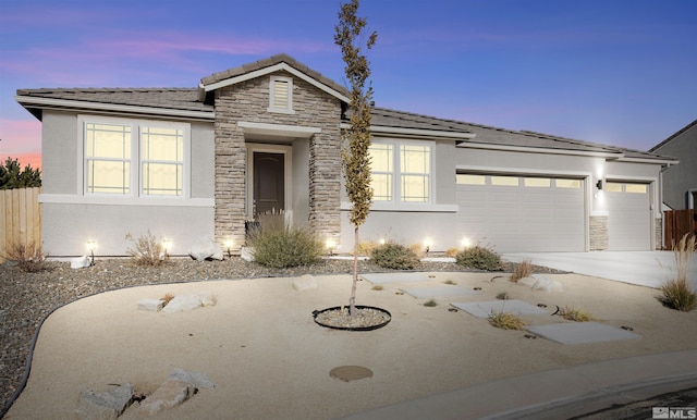 prairie-style home with a garage