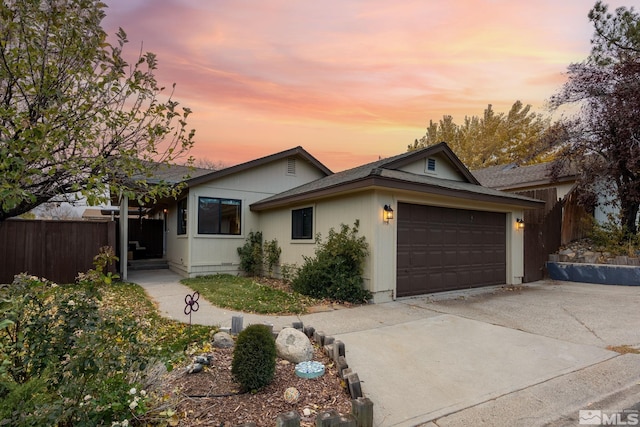 single story home featuring a garage