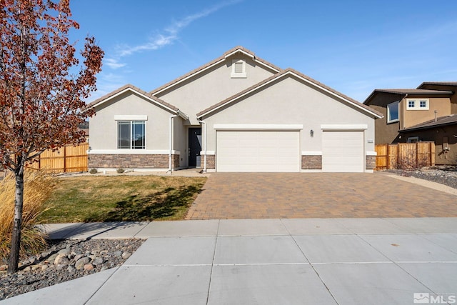 view of front of home with a garage