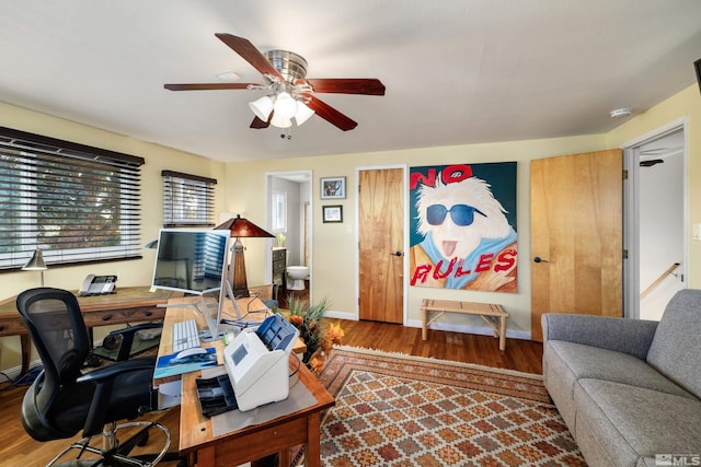 office area featuring hardwood / wood-style floors and ceiling fan