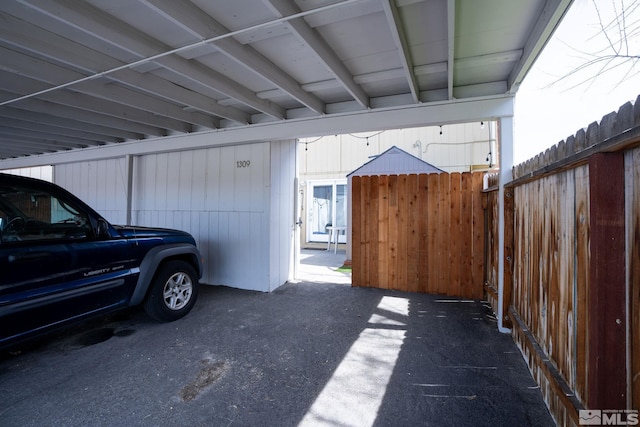 exterior space featuring a carport