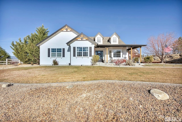 view of front of home with a front lawn and a porch