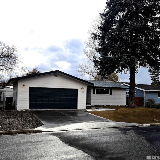 single story home with a garage