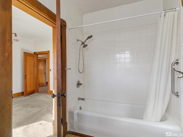 bathroom featuring shower / bath combo with shower curtain