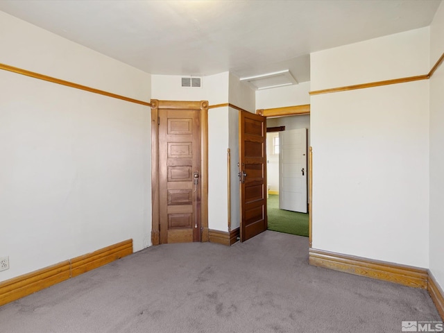 unfurnished bedroom featuring carpet flooring