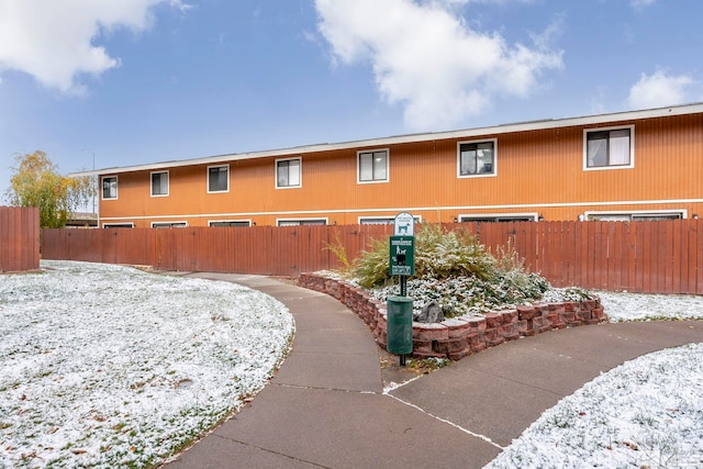 view of snow covered property