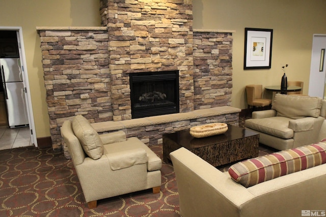 living room featuring a fireplace