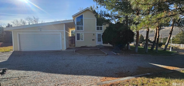 view of front of home with a garage