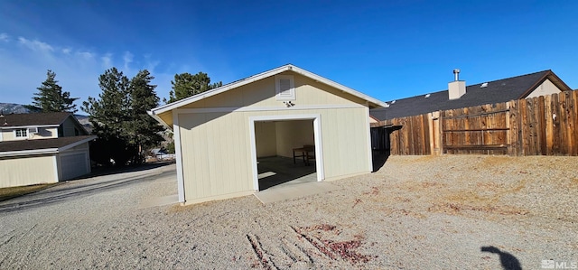 exterior space featuring a storage unit