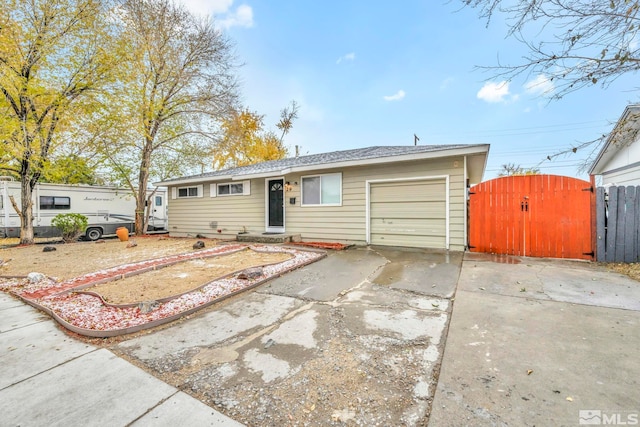 single story home with a garage