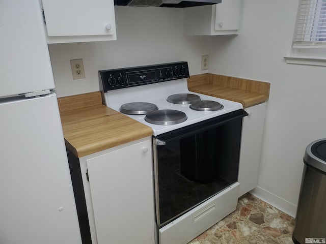 kitchen with white cabinetry, white appliances, and extractor fan