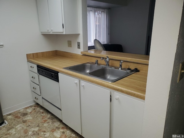 kitchen featuring white cabinets, dishwasher, and sink