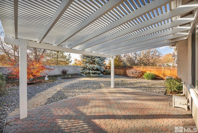 view of patio featuring a pergola