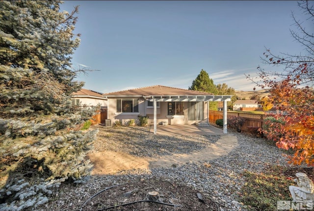 rear view of house with a patio area