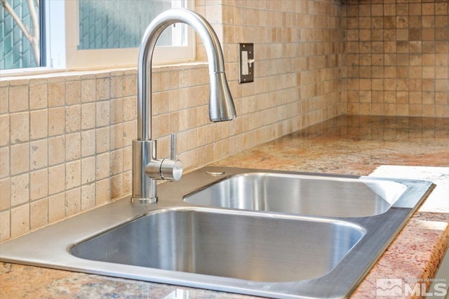 room details with tasteful backsplash and sink