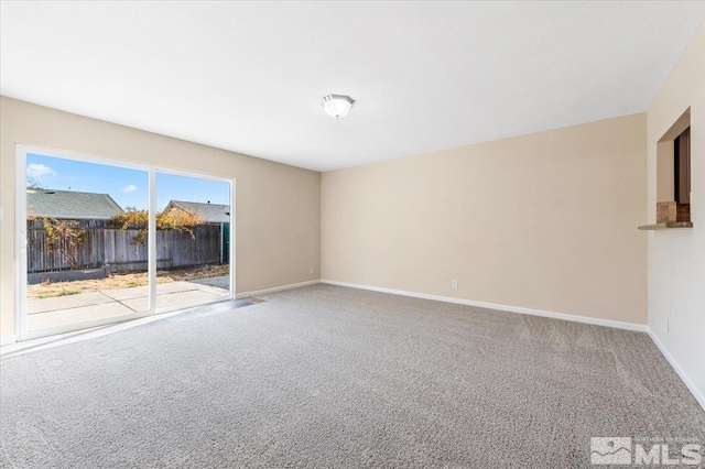 view of carpeted spare room