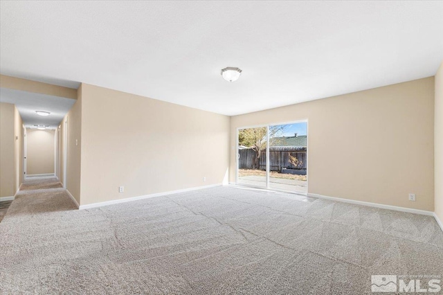 unfurnished room with light colored carpet