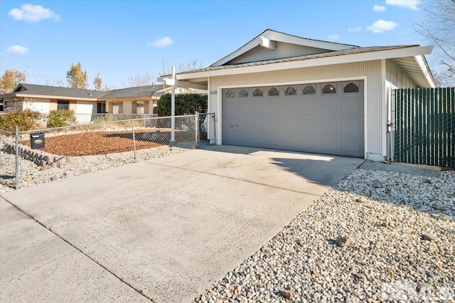 ranch-style home featuring a garage