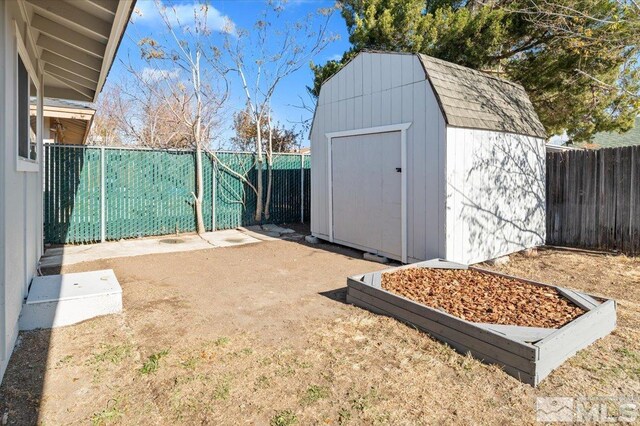 exterior space featuring a storage unit