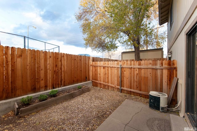 view of yard featuring central AC unit