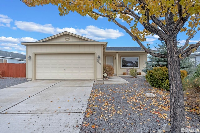 single story home featuring a garage