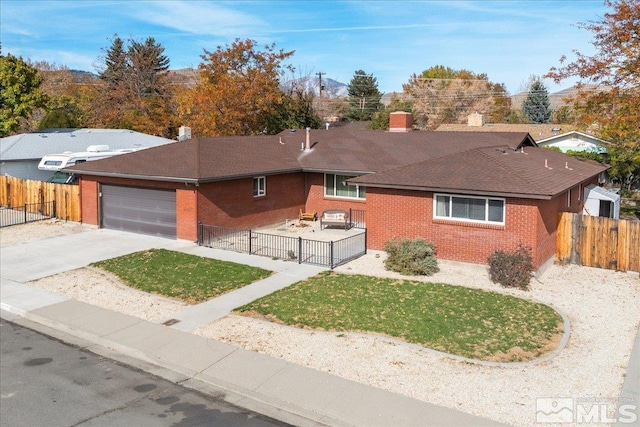 single story home with a garage