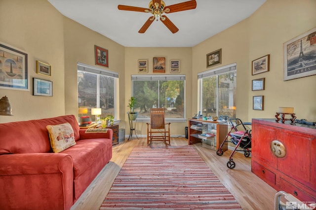 interior space with ceiling fan and light wood-type flooring