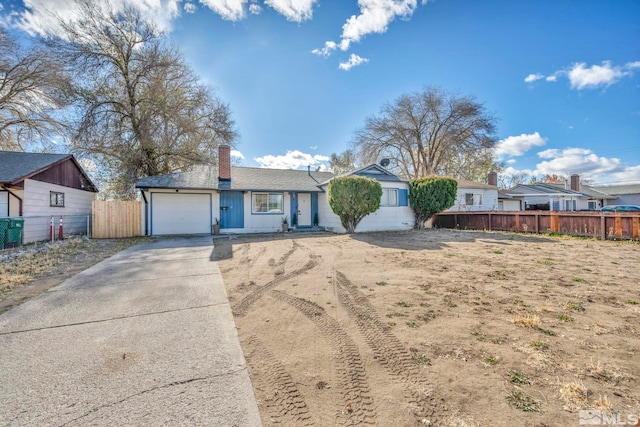 single story home featuring a garage