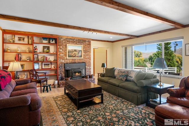 living room with beamed ceiling